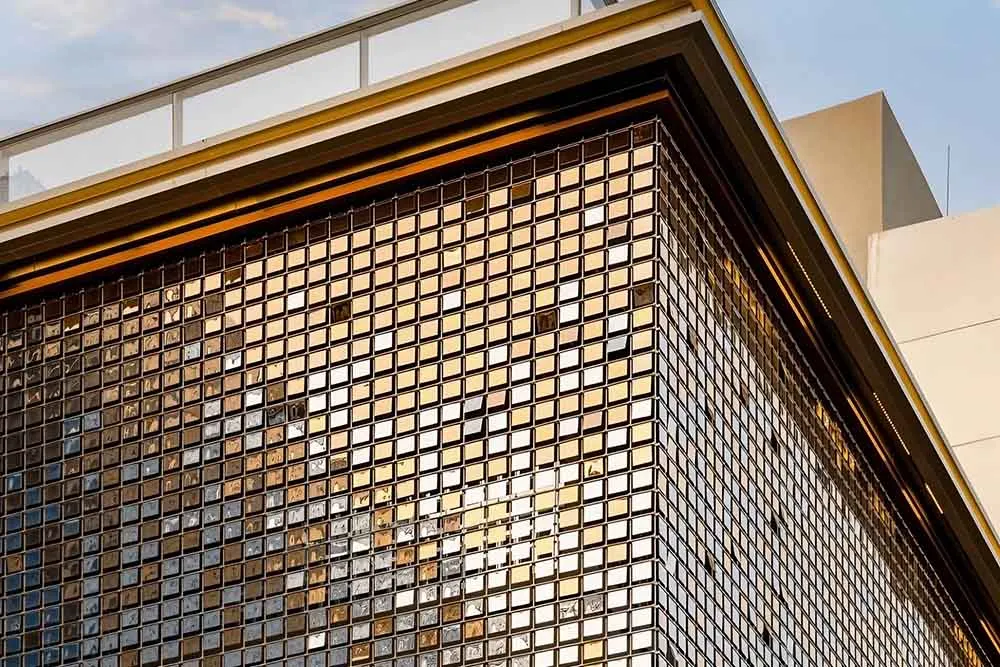 Modern building featuring a kinetic facade with movable architectural metal panels